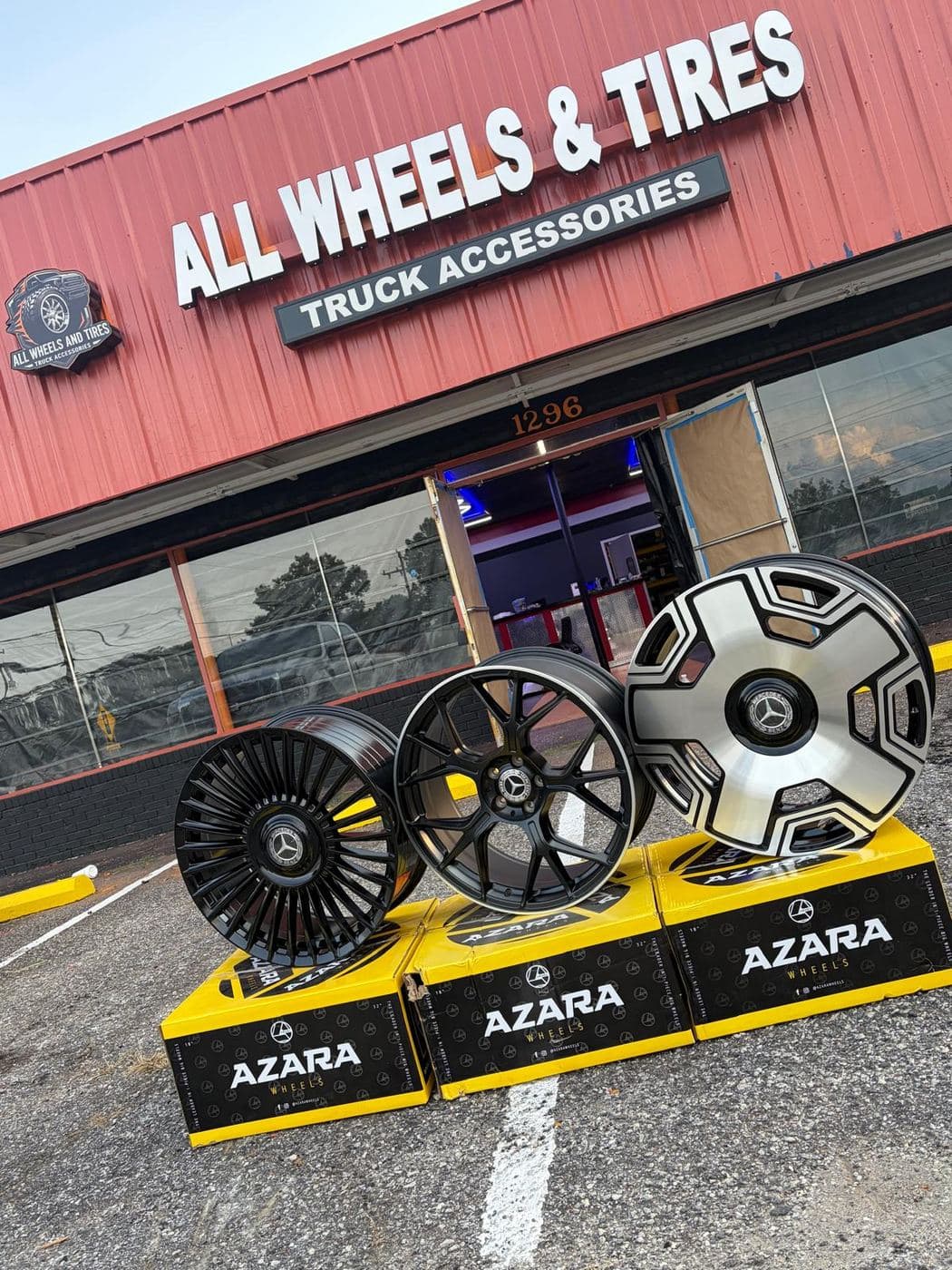 Three new wheels on display outside the storefront